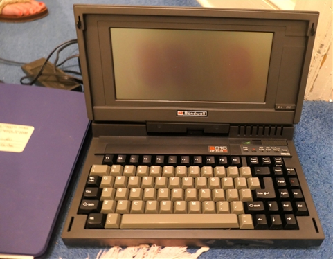 Bondwell B310 Superslim Laptop Computer - with Instruction Manual, Charger, Battery , Manual, and Instructions for Quicken and MS - DOS 5 