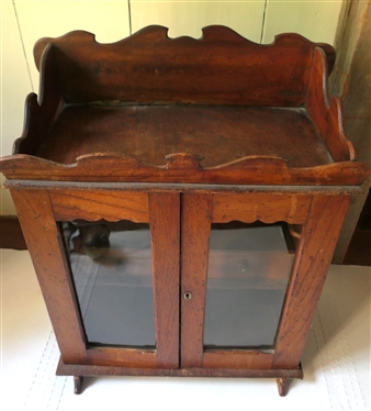Miniature Cupboard Fitted To Hold Tobacco & Pipes - 2 Drawers Inside - Pipe Holders Line Both Sides - Scalloped Gallery Top and Backsplash and Tops of Doors - Overall Measures 20 Tall 16 1/2 by...