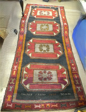 Hand Knotted Oriental Rug - Signed in Weave Feiside Abi Aydey Sultan - Red, Black, and Beige - Needs Cleaning Rug is 130 By 54