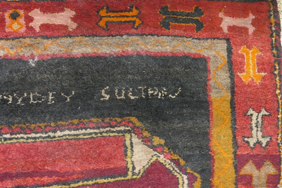 Hand Knotted Oriental Rug - Signed in Weave Feiside Abi Aydey Sultan - Red, Black, and Beige - Needs Cleaning Rug is 130 By 54