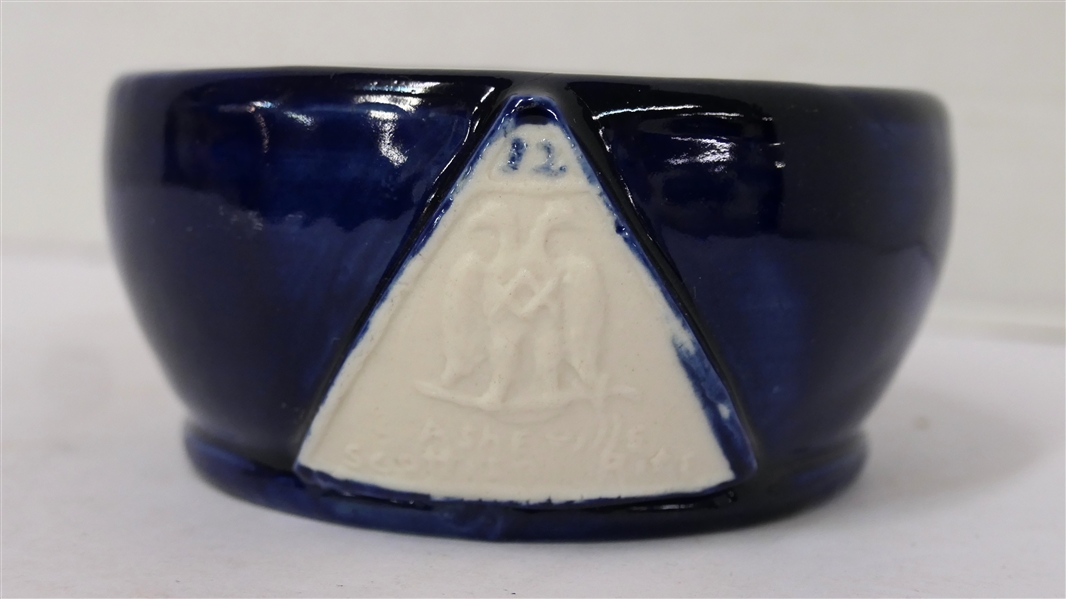 1942 Pisgah Forest Cameo Pottery Bowl - Asheville Scottish Rite on Front - Dated 1942 on Bottom- Cobalt Blue Glaze on Body Pink Glazed Interior - Bowl is 2 1/2" Tall 4 3/4" Across
