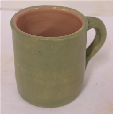 1951 Pisgah Forest Cameo Mug with Woman at Spinning Wheel - Green Glazed Body Pink Glazed Interior - Mug is 3 1/2 Tall - Stamped 1951 Pisgah Forest on Bottom 