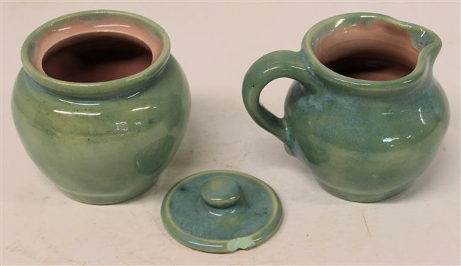 1938 Pisgah Forest Cream and Sugar Set - Light Turquoise / Green Exterior Glaze with Pink Interior - Cream Measures 3 1/4 Tall Sugar is 3 1/2 with Lid - Both Stamped Pisgah Forest 38 
