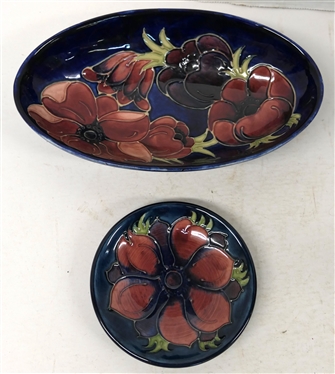 2 Pieces of Moorcroft Pottery - Both Cobalt Glazed with Dark Red Flowers - Smallest Round Dish is 4 1/4 Across Larger Oval Bowl is 2 tall 9 by 5 1/4 