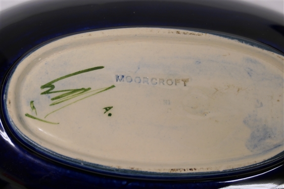 2 Pieces of Moorcroft Pottery - Both Cobalt Glazed with Dark Red Flowers - Smallest Round Dish is 4 1/4 Across Larger Oval Bowl is 2 tall 9 by 5 1/4 