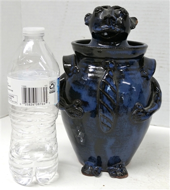 Jack T. Maness North Carolina Pottery Figural Jar - Man with Neck Tie - Signed in Script on Bottom and Stamped on Underside of Lid - Black and Blue Glazed - Small Chip on Ear - Jar is 9 1/2 Tall 