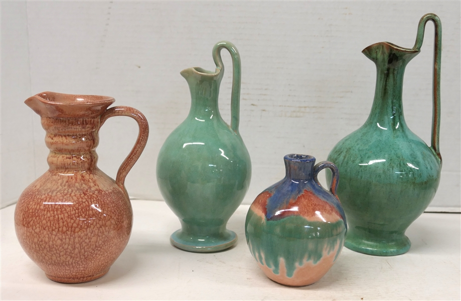 4 Pieces of Seagrove North Carolina Art Pottery - All Unsigned - 9" Rebecca Pitcher with Variegated Green Glaze, 8" Rebecca Pitcher with Lighter Green Glaze, Red Crackle Glazed 6 1/2" Pitcher, and...