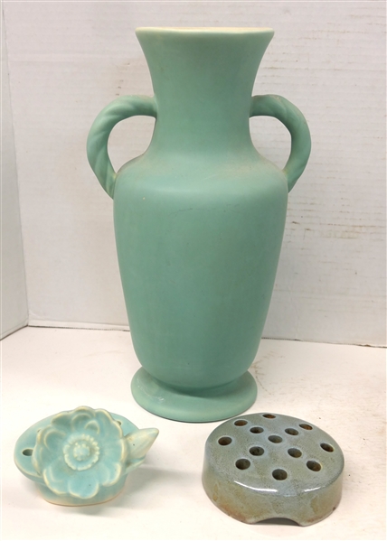 3 Pieces of Pottery - 12" Coors Pottery Matte Green Vase with Twisted Handles, Matte Blue Flower Frog with Flower, and Weller Flower Frog with Speckled Glaze - Weller Frog is 1 1/2" tall 4" Across