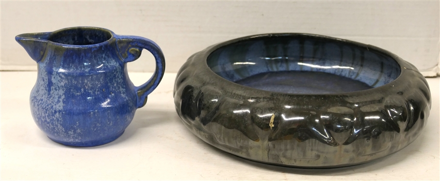 2 Pieces of Fulper Pottery - Pitcher with Blue Glaze - Number 830 and Low Bowl with Black Mirrored Glaze and Blue Interior - Repaired on Side - Pitcher is 4 Tall 