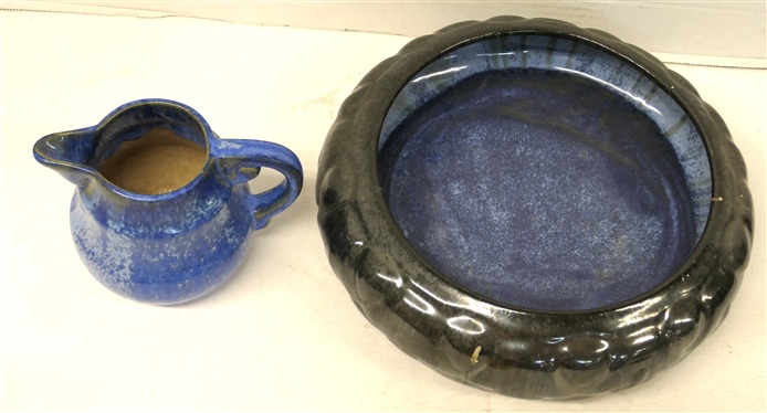 2 Pieces of Fulper Pottery - Pitcher with Blue Glaze - Number 830 and Low Bowl with Black Mirrored Glaze and Blue Interior - Repaired on Side - Pitcher is 4 Tall 