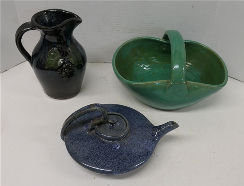 3 Pieces of Art Pottery -9 Pitcher with Applied Grapes by Bobby Ferguson - Gillsville, GA, Teagues Pottery Tea Pot - Broken Handle, and Large Green Glazed Basket with Broken Handle 