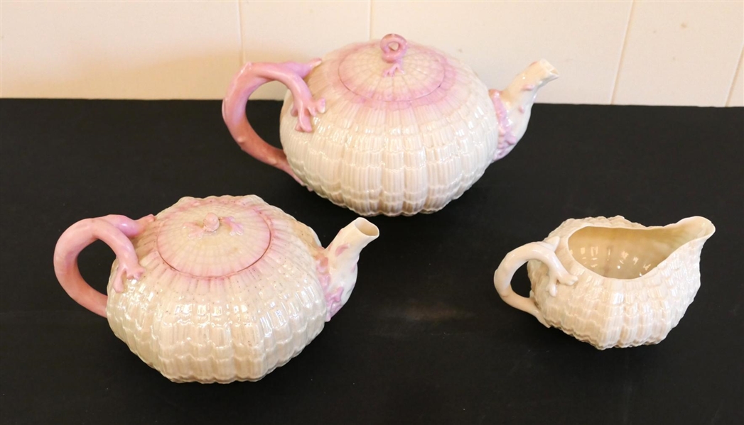 Outstanding Belleek Shell Form Tea Service - 2 Tea Pots and Small Pitcher - Largest Pink Handled Tea Pot is 4 1/2" Tall 9" Spout to Handle - Brown Mark