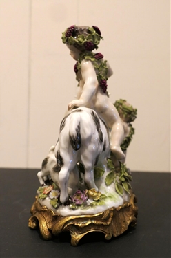 German Porcelain Goat and Putti Figure - Mother and Baby Goat with2 Putti Figures -Ornate Metal Base -  8 Tall 8 Across - Marked 180 SV - Some Minor Broken Petal and Nicks