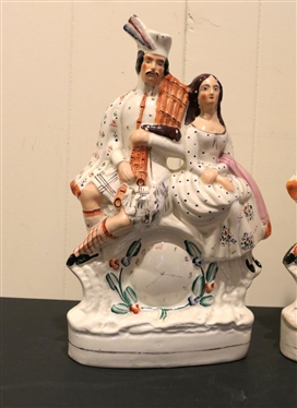 Pair of 19th Century Staffordshire Courting Figures with Clocks in Centers -Hand Painted - Some Minor Paint Flakes - Figures are Each 14 1/2 Tall 