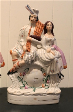 Pair of 19th Century Staffordshire Courting Figures with Clocks in Centers -Hand Painted - Some Minor Paint Flakes - Figures are Each 14 1/2 Tall 