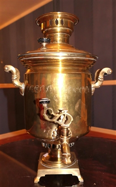 19th Century Russian Brass Samovar - Many Stamps on Front - Footed Brass Base - Spout on Front and Wood Handles - Samovar Measures 20 Tall 