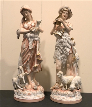 Pair of Antique Porcelain Figures - Woman with Goats and Man with Sheep - Hand Painted - Each Figure is 16 tall - Goat Ear is Chipped Otherwise Both are in Good Overall Condition 