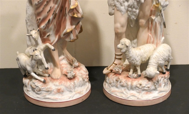 Pair of Antique Porcelain Figures - Woman with Goats and Man with Sheep - Hand Painted - Each Figure is 16 tall - Goat Ear is Chipped Otherwise Both are in Good Overall Condition 