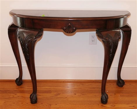 Chippendale Style Mahogany Finish Demilune Table - Shell Emblem on Front Apron - Ball and Claw Feet - Table is 30" Tall 41" By 16" 