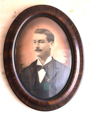 Turn of The Century Framed Photo of Attractive Gentleman - Bowed Glass Oval Frame - Frame is 24" by 18" 