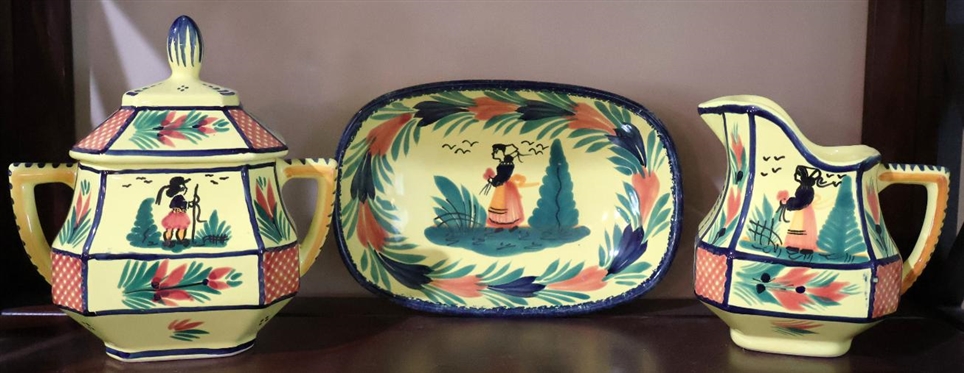 3 Pieces of Quimper France Hand painted French Pottery - Yellow Background - Cream, Sugar, and Oval Bowl - Creamer is 4 1/4" Tall - Bowl is 7" By 4 3/4" 