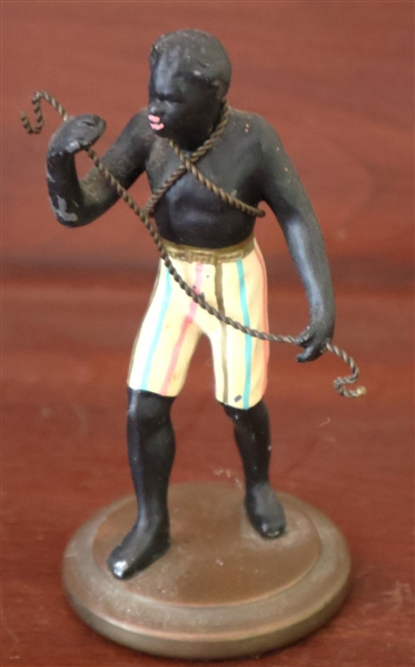 Petites Choses Hand Painted Metal Blackamoor Statue -Original Sticker - Nubian Man with Rope Around Neck, Chest, and In Hand - Figure is4 3/4" Tall - Original Sticker on Bottom 
