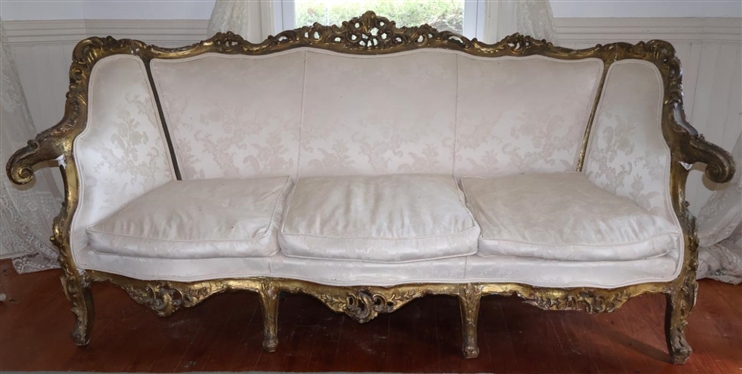 Elaborate Rococo Gold Gilt Sofa with Ornate Gold Gilded Scrolled Frame Off White Brocade Upholstery - Broken Area on Right Front Apron - Sofa is 79 Long 40 Tall