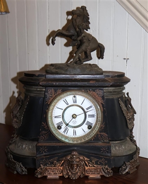 Beautiful Ansonia Iron Mantle Clock Fancy Gold Gilded Brass Mounts with Phoenix Birds and Faces - Top is Adorned with Rearing  Horse Statue - Key Wind Movement with Pendulum - Ansonia Movement...